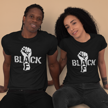Load image into Gallery viewer, African American black man and black woman wearing a black t-shirts with a fist and the word black in white color and AF in black color on the arm of the fist. they also have on black jeans in the picture.