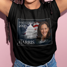 Load image into Gallery viewer, Vice President Kamala Harris with the flag and white house on a black t-shirt that a young black woman is wearing and she has blue jeans on and long braids. African American T-Shirt - Black Pride - Black History