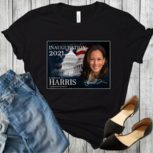Load image into Gallery viewer, Vice President Kamala Harris with the flag and white house on a black t-shirt. With black shoes and blue jeans at the bottom corners of the picture.