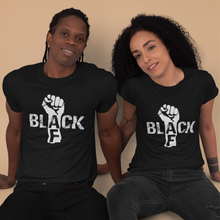 Load image into Gallery viewer, African American black man and black woman wearing a black t-shirts with a fist and the word black in white color and AF in black color on the arm of the fist. they also have on black jeans in the picture.
