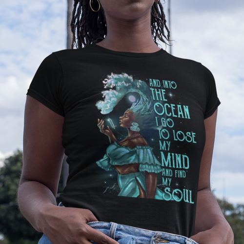 African American Black woman with ocean wave hair on a black t-shirt with the words And Into The Ocean I Go To Lose My Mind And Find My Soul.