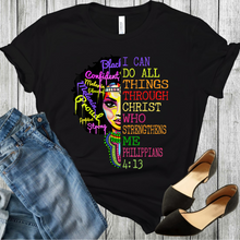 Load image into Gallery viewer, African American black Christian women&#39;s black t-shirt with bible verse PHILIPPIANS 4:13 with black shoes and blue jeans in bottom corners of the picture.
